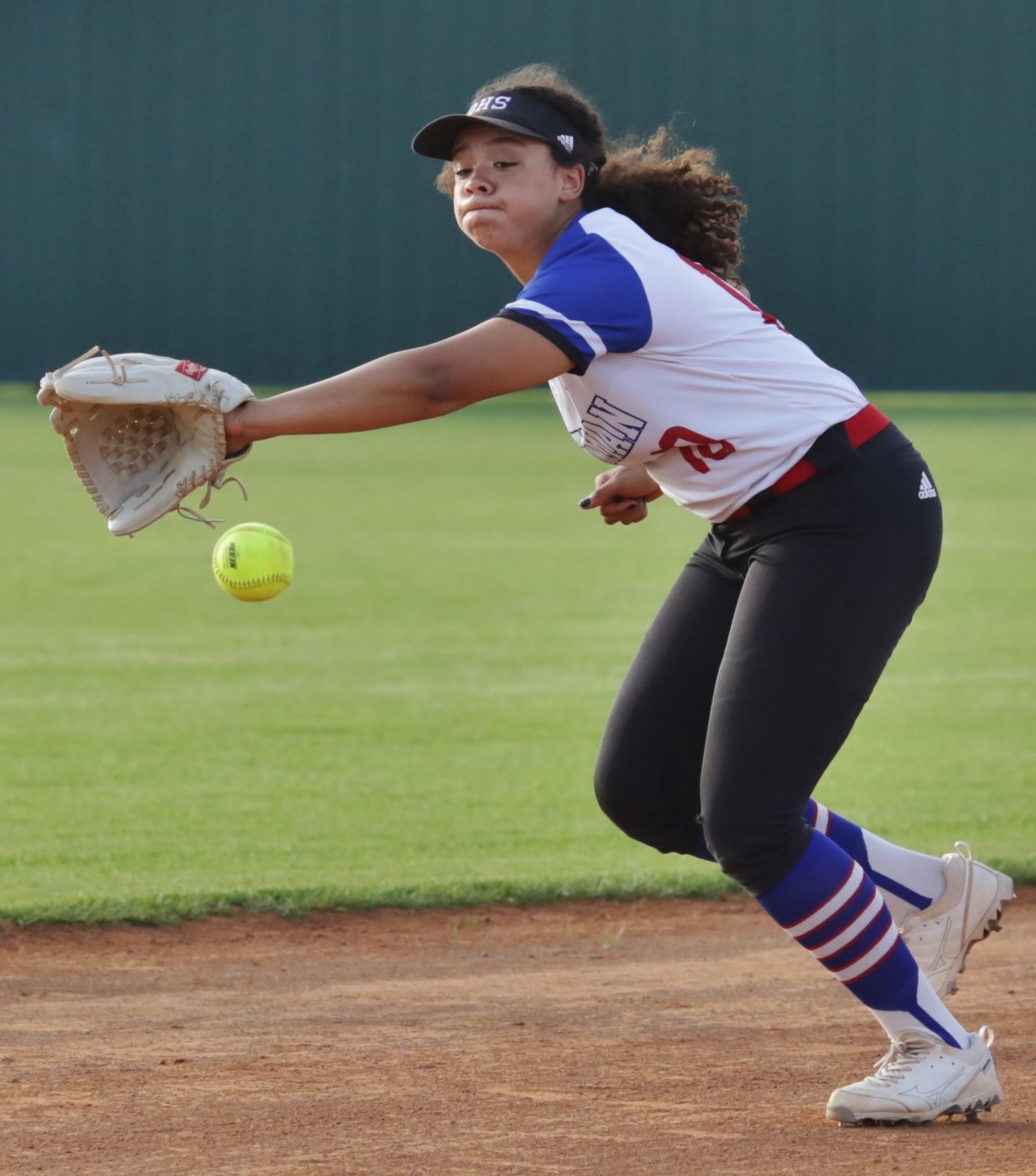 Lady Bulldog Ashley Davis makes a play on a ball in the fifth inning against Winnsboro. Davis had a good night at third base, accounting for three put-outs and triggering a double play.